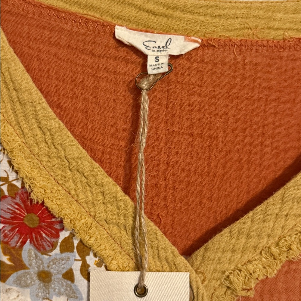 8- Easel Warm Toned V-Neck Top